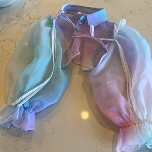 SELKIE rainbow puff shrug